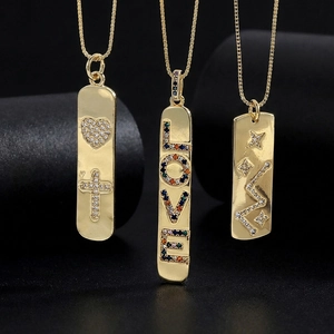 Minimalist gold bar necklace with zircon LOVE heart and star pendant on black background