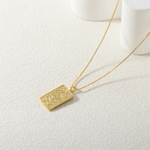 Detailed macro of golden Solomon Tarot pendant with Eye of Providence and Star of David