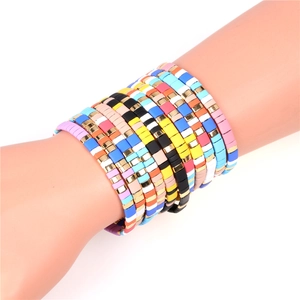Bohemian colorful enamel tila bead stretch bracelets set for women on model wrist