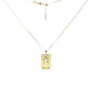Gold Tarot necklace with engraved sunburst square pendant and central white zircon stone