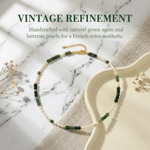 Detailed view of vintage necklace with green agate beads and white freshwater pearls