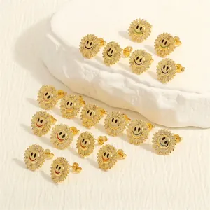 Detailed top view of sixteen golden sunflower earrings with zircons and colorful smiley faces