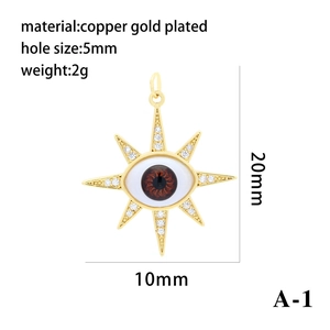 Macro shot of evil eye star pendant showing gold-plated copper finish and 20mm dimensions