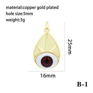 Macro view of gold plated copper evil eye pendant with 25mm height and 5mm hole