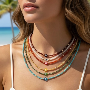 Colorful evil eye beaded necklace set in layered summer beach vacation style