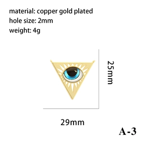 Detail view of gold-plated triangle evil eye pendant with 25x29mm size and weight specs