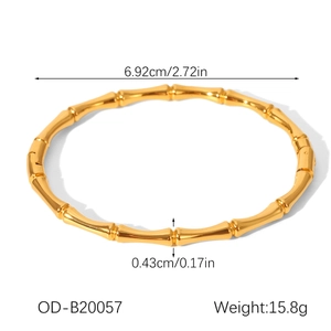 Detail view of 18K gold-plated stainless steel bamboo bangle showing size and weight specs
