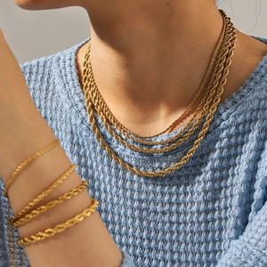 Set of 18K gold plated stainless steel rope chains for neck and wrist on model