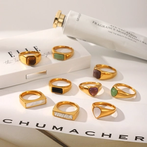 Vintage gold plated stainless steel rings with natural stones in elegant setup