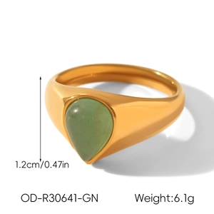 French vintage gold signet ring featuring a green natural stone teardrop and specs
