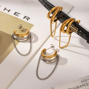 Minimalist gold and silver two-tone triple-ring earrings with long chain fringe pendants