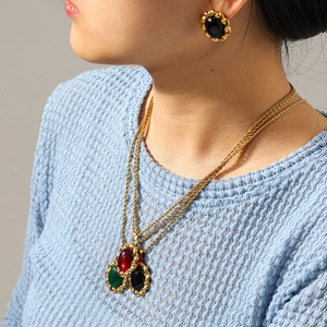 French vintage jewelry set with oval gemstones and gold chain necklace for women