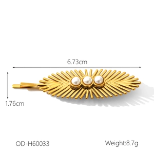 Detail showing dimensions of leaf-shaped gold hair clip with pearls for women