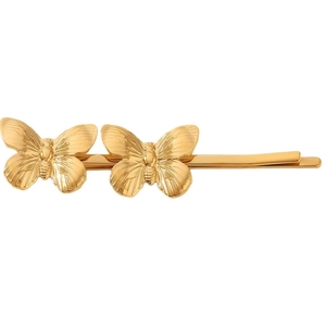 Elegant gold butterfly hair clips with metallic texture on white background