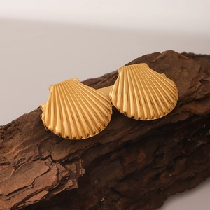 Pince à cheveux coquillage dorée en acier inoxydable avec finition brillante