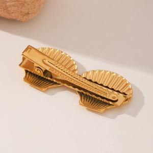 Pince à cheveux élégante en acier inoxydable doré avec design texture coquillage marin
