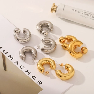 Chunky C-shaped stainless steel hoop earrings in gold and silver polished finishes