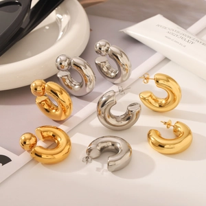 Minimalist chunky C-shaped hoop earrings in gold and silver polished stainless steel