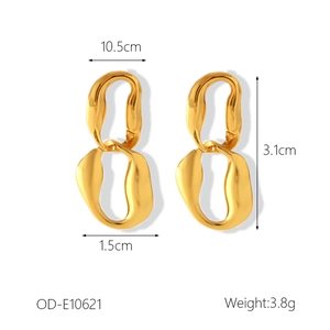 Detail view of irregular gold-plated hoop earrings with lava-like fluid design and dimensions