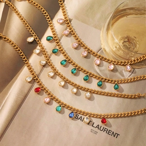 Gouden grove schakelarmband set met kleurrijke druppelvormige zirkoon hangers