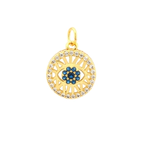 Macro detail of gold plated evil eye pendant with blue zircon and sunburst design