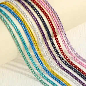 Detailed view of multiple colorful Cuban link bracelets with vibrant paint finish
