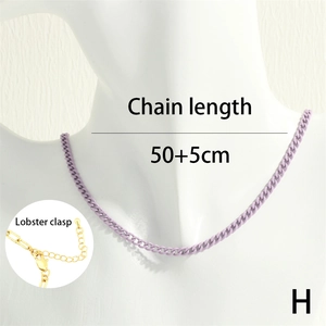 Detail view of purple Cuban link chain with gold lobster clasp and adjustable length