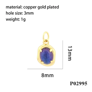 Detail of 13mm gold plated oval pendant with blue sandstone inlay and size annotations