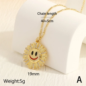 Detail of 18K gold sunflower smile pendant with white zircons on a wavy chain