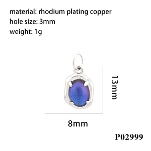 Detail view of oval blue resin pendant in rhodium-plated copper base with dimensions