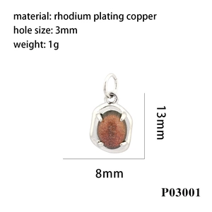 Detail of 18K gold plated oval sunstone pendant with 13x8mm size and rhodium copper frame