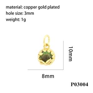 Detailed view of 18K gold-plated oval pendant with green glitter inlay and dimensions