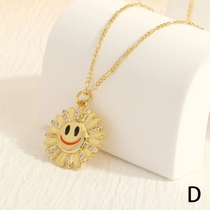 Macro shot of gold sun flower smiley pendant necklace with sparkling micro-pave crystals