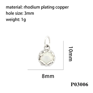 Macro shot of 18K rhodium plated copper oval pendant with 8x10mm white enamel inlay