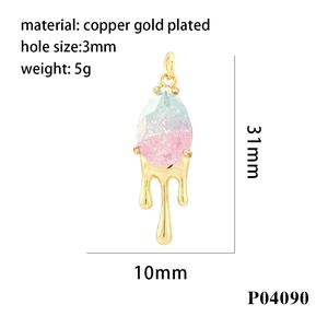 Macro detail of 31mm 18K gold-plated lava teardrop pendant with blue-pink crystal