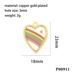 Detail of white enamel heart pendant with colorful stripes and zircon inlay on gold plating