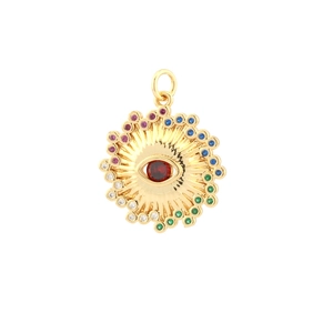 Macro detail of evil eye jewelry pendant with red gemstone and colorful cubic zirconia