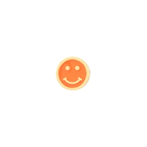 Close-up of orange enamel smiley face charm with a polished gold-plated copper edge