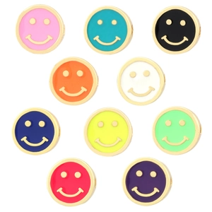 Macro detail of colorful enamel smiley face beads for DIY jewelry making accessories