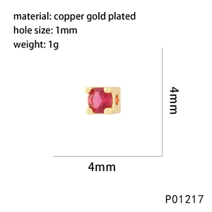 Detail of 4mm gold plated copper bead with red zircon and 1mm hole size