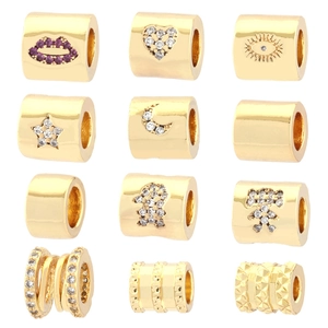 Lot de 12 perles dorées serties de zircons motifs cœur lèvres et œil protecteur