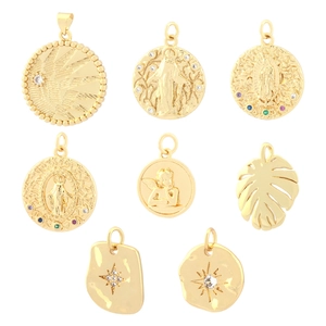 Gold religious pendants set with colorful zircon stones in embossed saint and sun designs