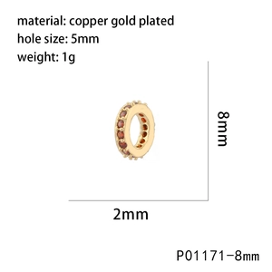 Macro view of copper gold plated bead with orange zircon inlay for jewelry making