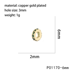 Detail view of 6mm gold plated copper spacer bead with green zircon inlays for jewelry