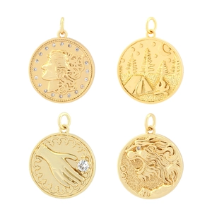 Set of four gold relief pendants featuring lion head and vintage portrait designs