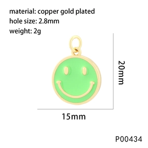 Detail showing 15mm green enamel smiley face pendant with gold plating and dimensions