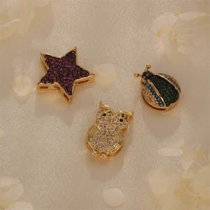 Gold-plated star owl and beetle pendants with colorful pavé cubic zirconia crystals