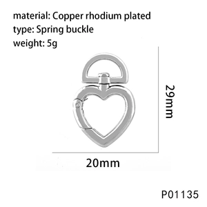 Polished heart-shaped spring buckle pendant in rhodium-plated copper, 29mm x 20mm detail