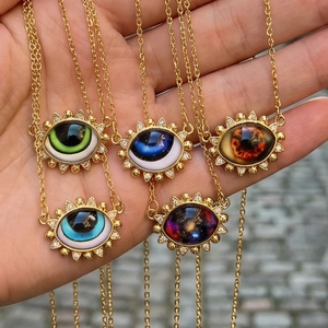 Vintage Turkish Evil Eye necklaces with colorful triangular pendants in gold chain