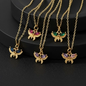 18K gold plated necklace featuring colorful cubic zirconia butterfly pendants on black stand